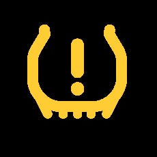 สัญลักษณ์สีเหลืองบนแผงคอนโซลรถยนต์เตือนลมภายในยางอ่อน